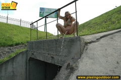 Blonde teen pisses from the height outdoor - N