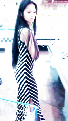 Sexy filipino babe in long striped skirt shopping for meat - N