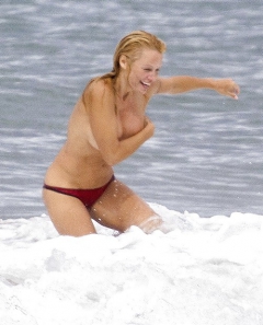 Pamela Anderson Goes Topless on a Beach in France - N