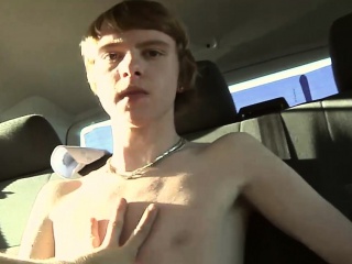 Cute amateur twink Lewis sucking a huge cock on a back seat