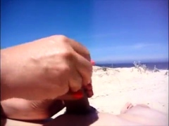 Amateur beach handjob